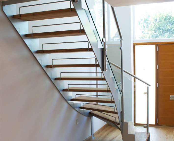 Bespoke Staircase Staines in a quarter turn steel and timber design.