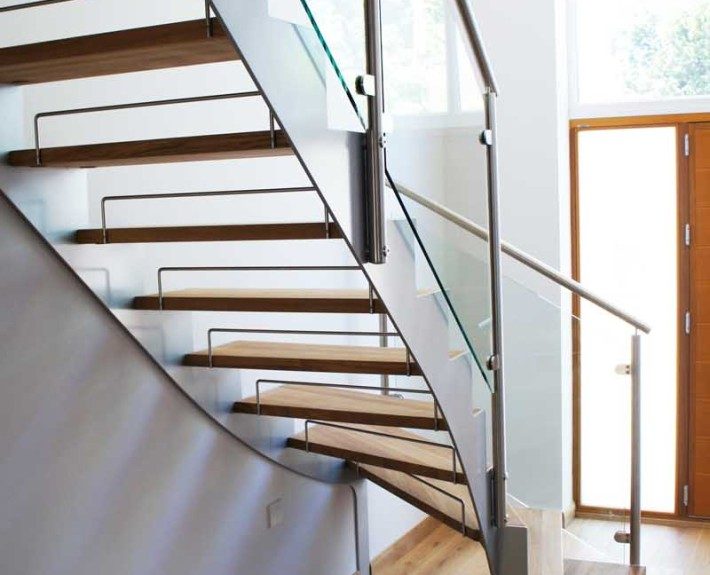 Bespoke Staircase Staines in a quarter turn steel and timber design.