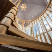 A view looking up at a Model 71 spiral staircase in Tilford