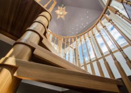 A view looking up at a Model 71 spiral staircase in Tilford