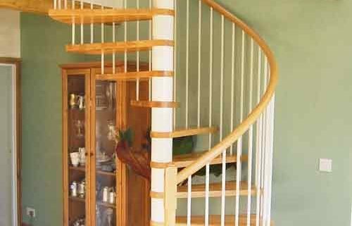 white steel spiral staircase with oak treads