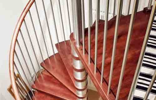 red timber spiral staircase with stainless spindles