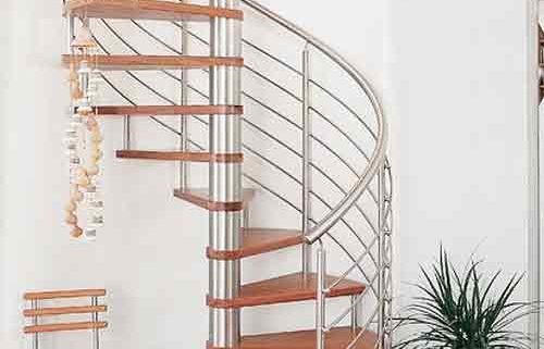 parquet timber floor with a stainless steel and wooded spiral staircase