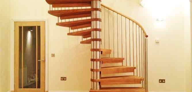 oak tread spiral staircase on a timber floor
