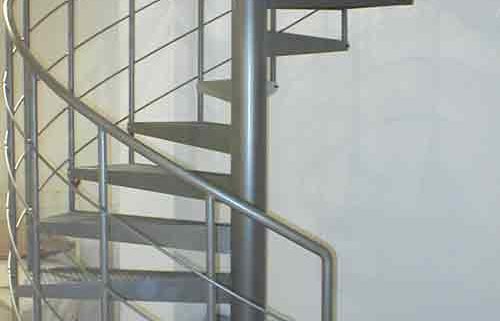 dark grey steel spiral staircase in a shop