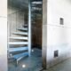galvanised internal spiral stair in a concreate shaft