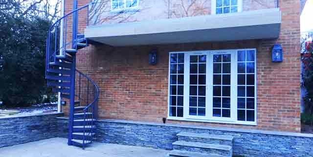 suspended outdoor balcony with frameless glass balustrade