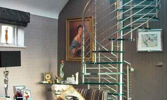 glass spiral stair to back of living room