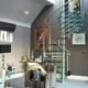 glass spiral stair to back of living room