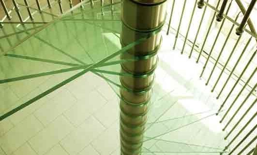large glass platform on a spiral staircase