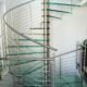 double flight large glass step spiral staircase with square platform