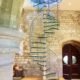 high spiral stair with glass steps in a church