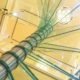 looking up at the glass steps of a spiral staircase