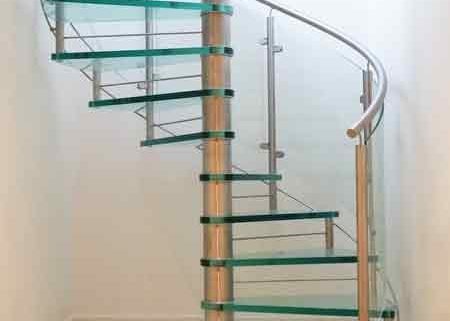 light and open glass spiral stair with stainless handrail
