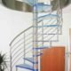 blue acrylic steps on a spiral staircase with stainless balustrade