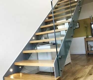 straight wood and steel stair with boxed in bottom step