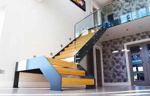 Bright hallway with a modern steel and wood staircase