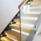 side of glass balustrade on a staircase