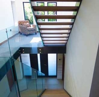 two straight stairs with open wooden steps