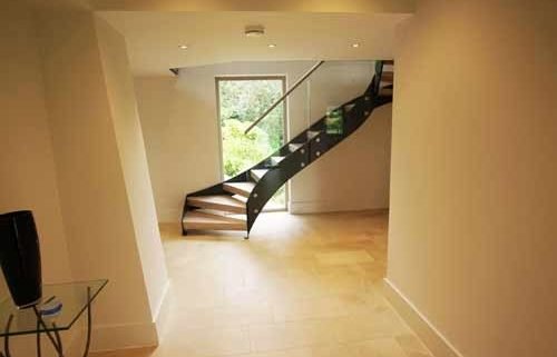 hallway with modern stair to rear