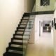 black open riser modern stair in a house