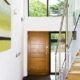 light and open hallway with steel stringers and glass balustrade