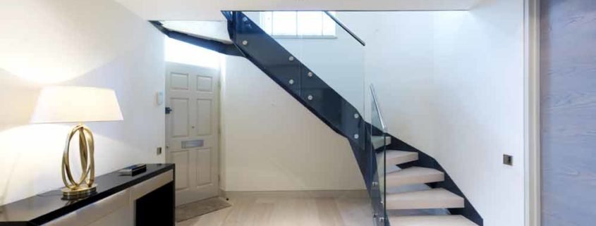 light timber floor with modern black steel and wood staircase