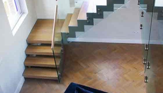 large modern stair in front of a window