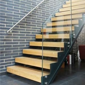 dark brick wall with timber treads stair with glass balustrade