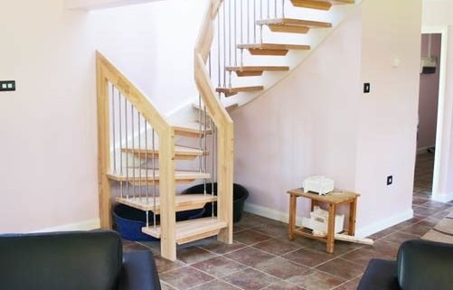 half turn with beech treads and handrail with tiled floor