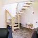 half turn with beech treads and handrail with tiled floor