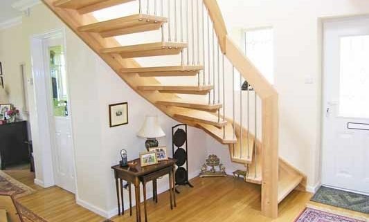 timber floor in a hallway with a quarter timber staircase with open risers