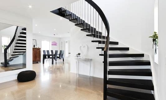 black floating timber staircase with open risers