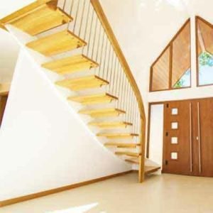 huge hallway with tiled floor and floating stair running up the wall