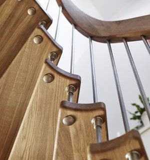 close up of underside of steps on a wooden stair