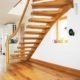 oak floor with a floating oak staircase above