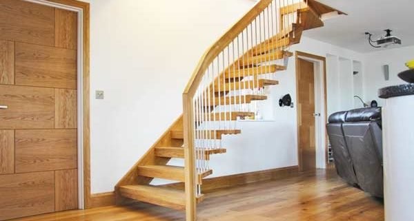 oak floor and white wall with floating staircase