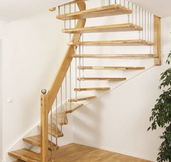 floating staircase with open treads with white wall background