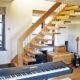 floating staircase in music room with keyboard