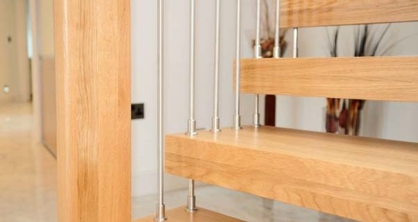 close up of a wooden step on a floating staircase