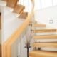curved inner handrail of a floating wood staircase