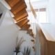 close up of timber handrail on a floating staircase