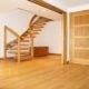 oak floor and oak door with floating oak stair to rear
