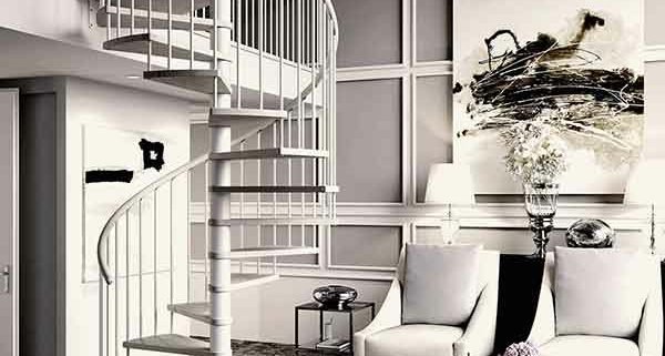 apartment with two chairs and painting on wall with light spiral stair running upto to a mezzanine level