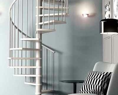 living space with light blue wall and soft seat with spiral staircase in light timber
