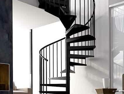 white walled living space with black spiral rising to next level