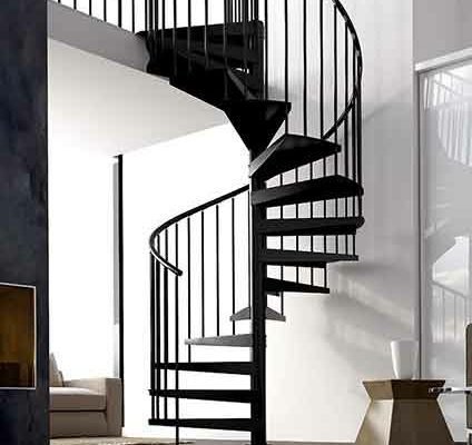 white walled living space with black spiral rising to next level