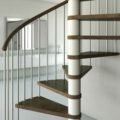 close up of a c20 spiral staircase with mirror in background.