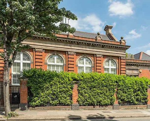 Outdoor view of old court house building featuring our staircase