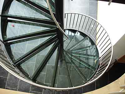 steel and glass spiral staircase looking from above